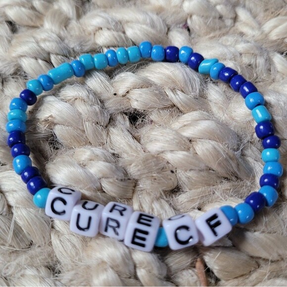 CURE CF Cystic Fibrosis Awareness Stretchy Purple And Blue Bracelet - Picture 1 of 4